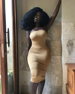 Ebony dress peekhole to breasts