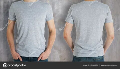 Download - Man wearing empty grey shirt on concrete background. 