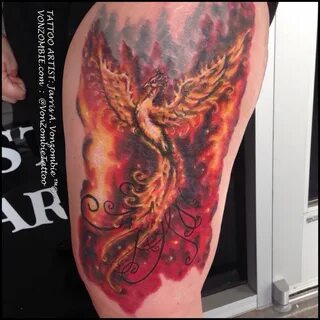 Phoenix rising thigh tattoo by Jarris Vonzombie.