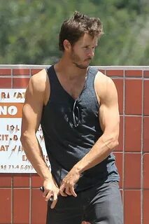 Ryan Kwanten displays his VERY muscular arms in grey singlet