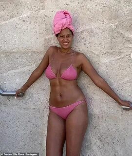 Tracee Ellis Ross flaunts her curvy figure in hot pink bikin
