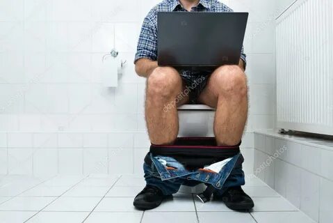 Man In Toilet Using Laptop Stock Photo by © AndreyPopov 6391