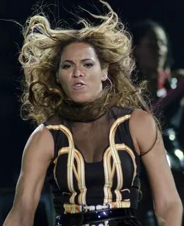 Beyonce is picture perfect in romper and fishnets as 'approv