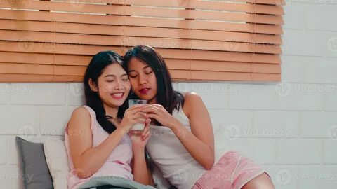 Asian Lesbian lgbtq women couple have breakfast at home. Young Asia lover girl h