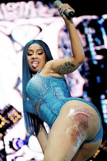 Cardi B’s Blue Denim Bodysuit & Thigh Chaps For Performance 