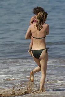 Ellen Pompeo - Wearing a sexy wet bikini on a beach in Maui 