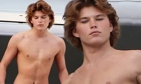 Shirtless Jordan Barrett flaunts his taut torso in Cannes Da