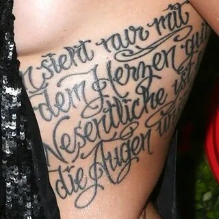 Ali Krieger's 2 Tattoos & Their Meanings - Body Art Guru