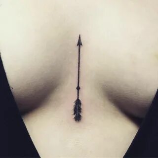 Arrow tattoo under boob