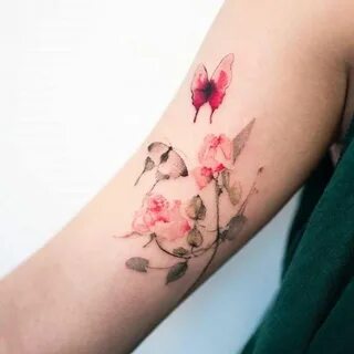 Watercolor pink rose and butterflies tattoo on the right bic