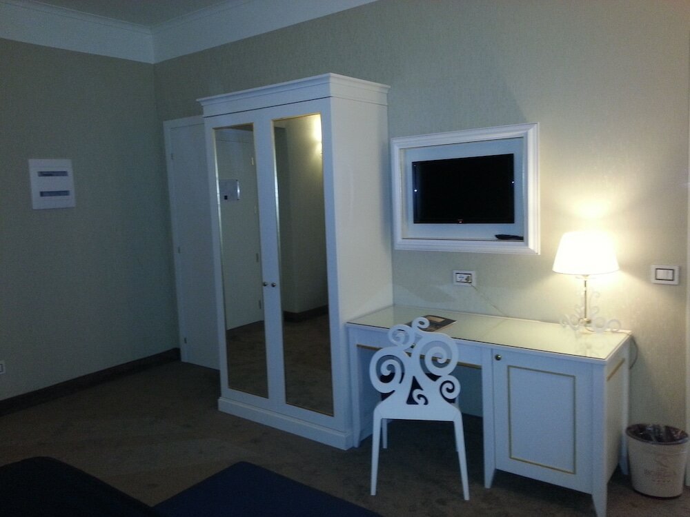 Фото Ih Hotels Roma dei Borgia