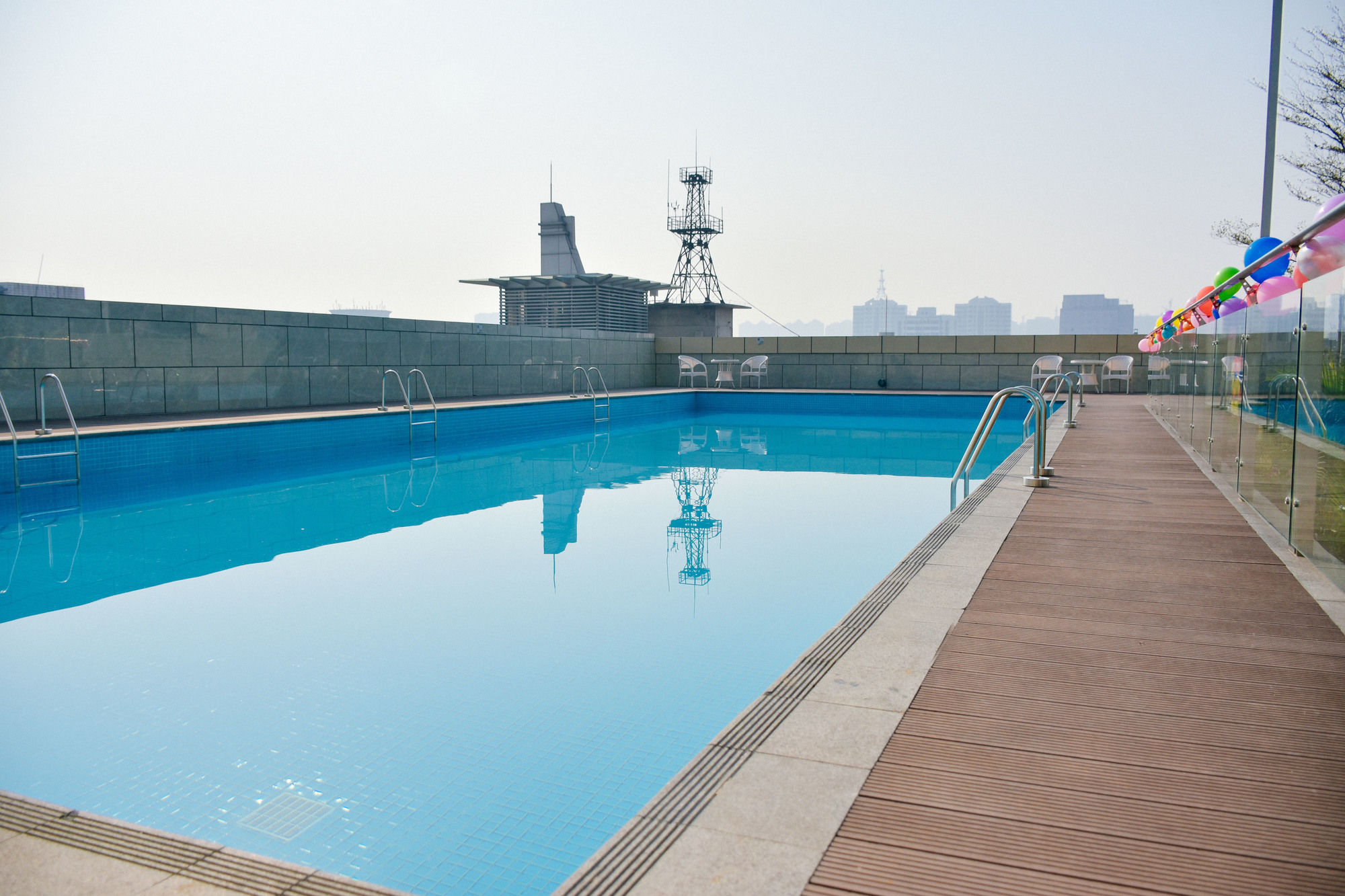 Фото Yuwa Serviced ApartHotel