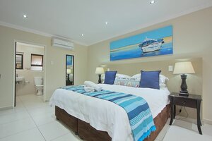 Гостиница Gecko Inn Guest House