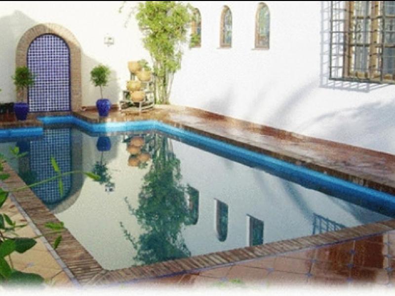 Фото Apartamentos Turisticos Alhambra