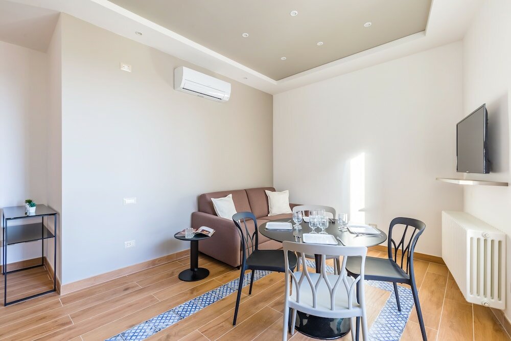 Фото Colonna Apartments by Wonderful Italy