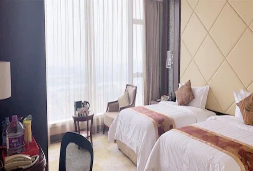 Фото Soluxe Hotel Guangzhou