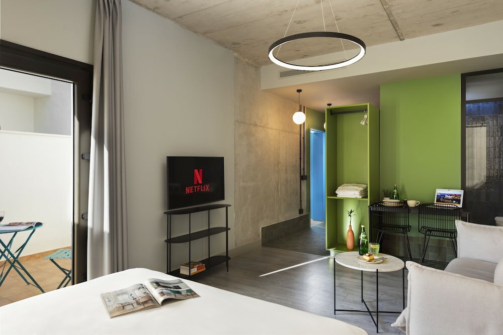 Фото Coeo ApartHotel Parras