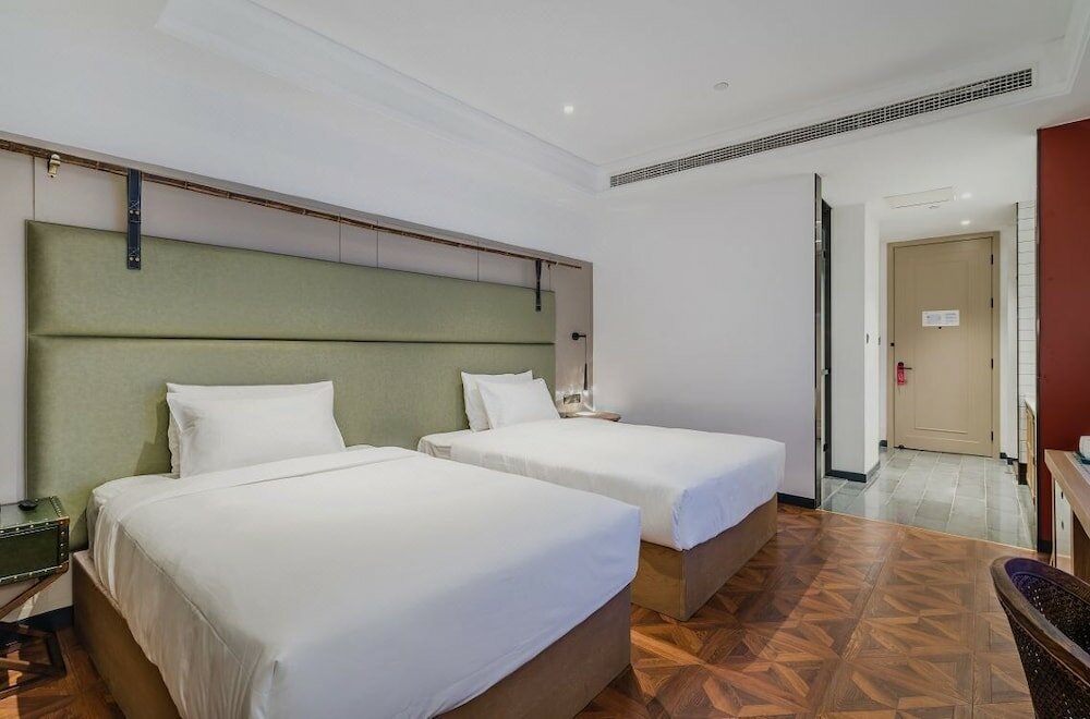 Фото Manxin Hotel Qingdao Zhanqiao