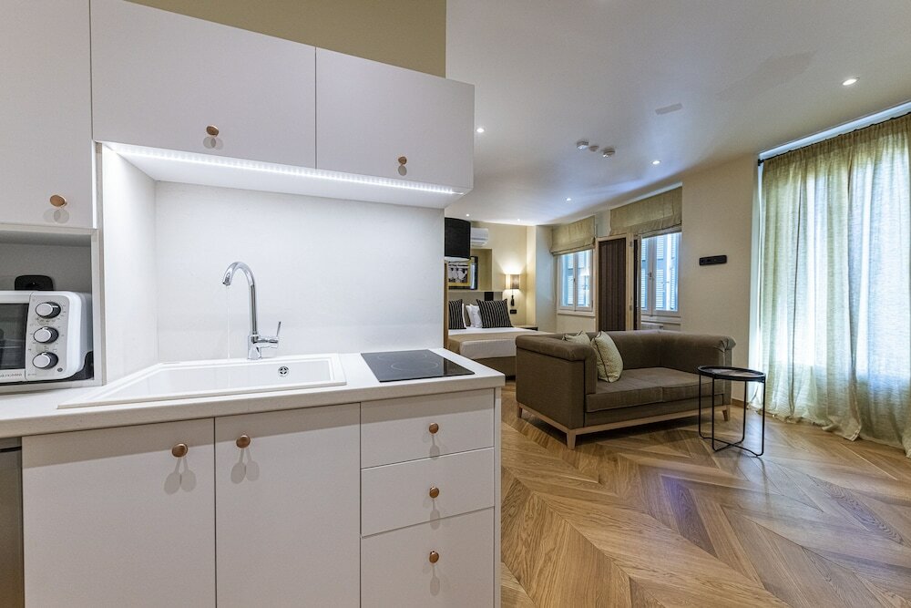 Фото Plaka Boutique Apartments