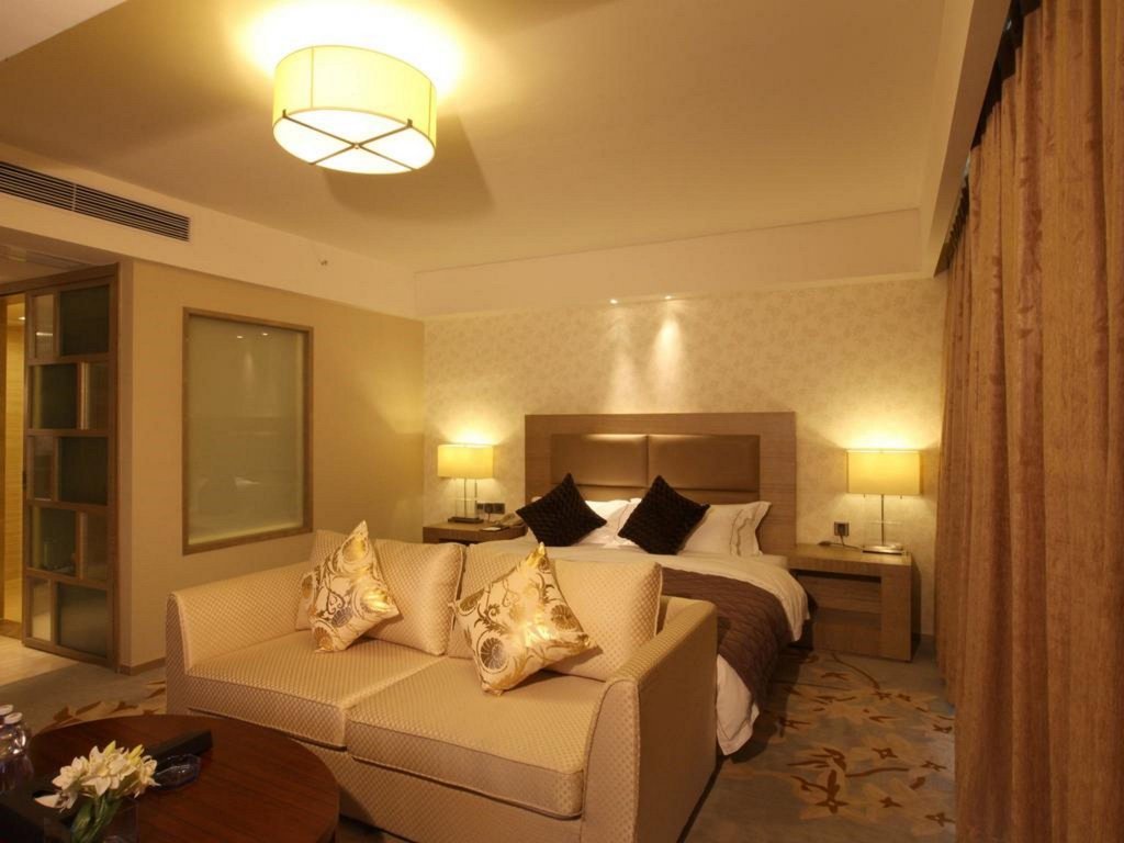 Фото Shenzhen New World Metro Grand Hotel