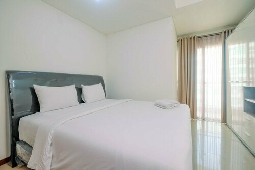 Гостиница Cozy and Minimalist 2br Green Bay Condominium Apartment в Джакарте