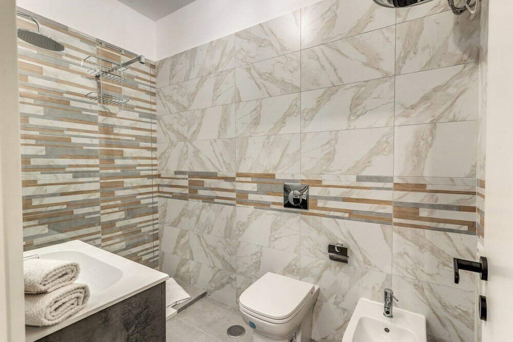 Фото The Quarters Naples Apartment