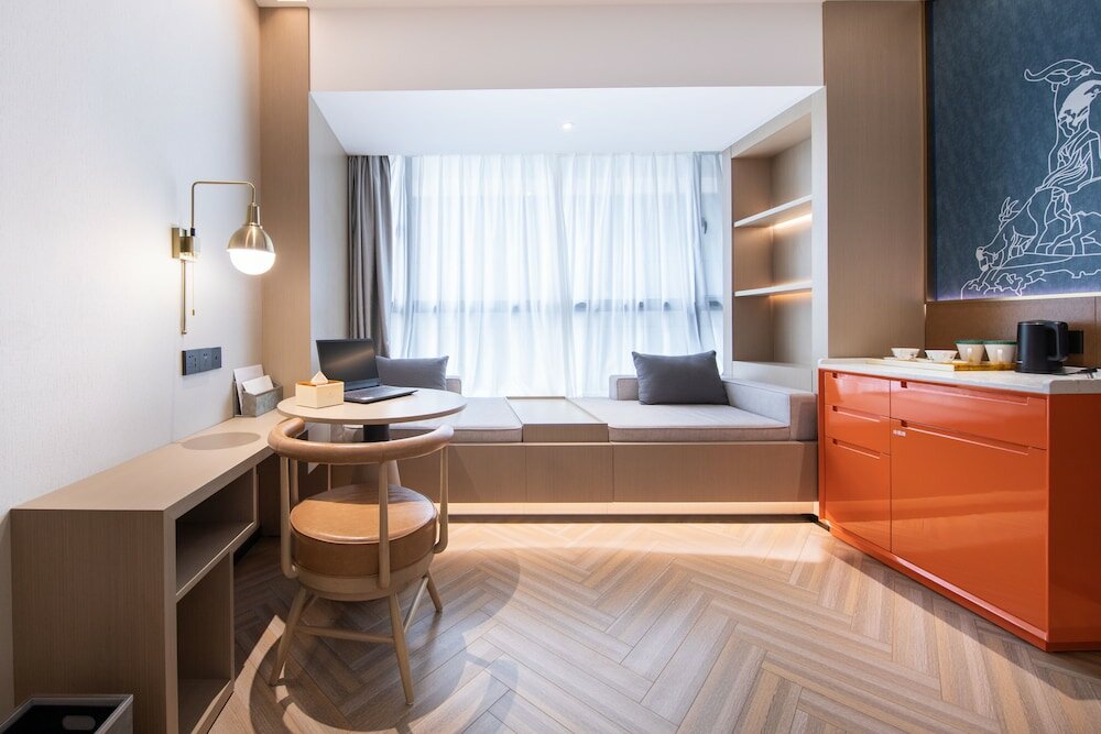 Фото Gz Baiyun Airport MeHood Liz Hotel T1