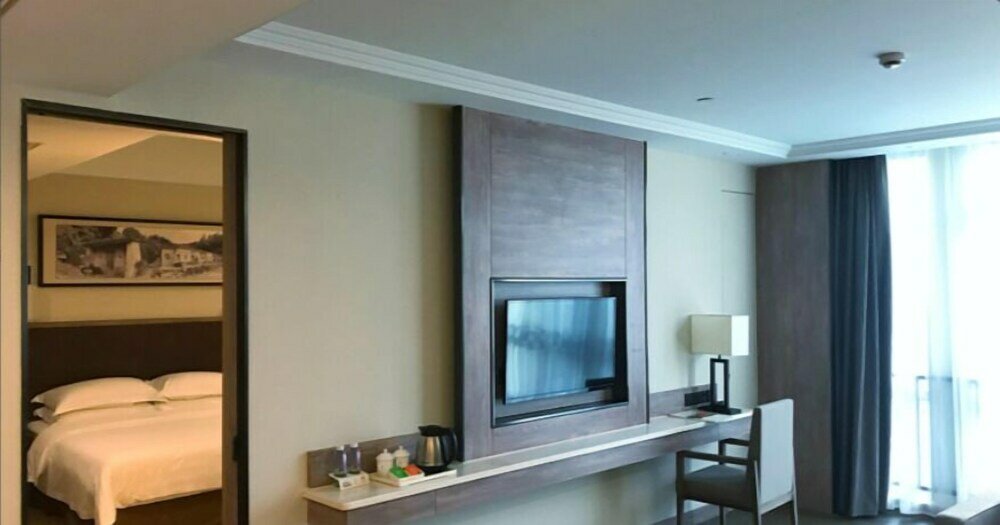 Фото Auden International Hotel