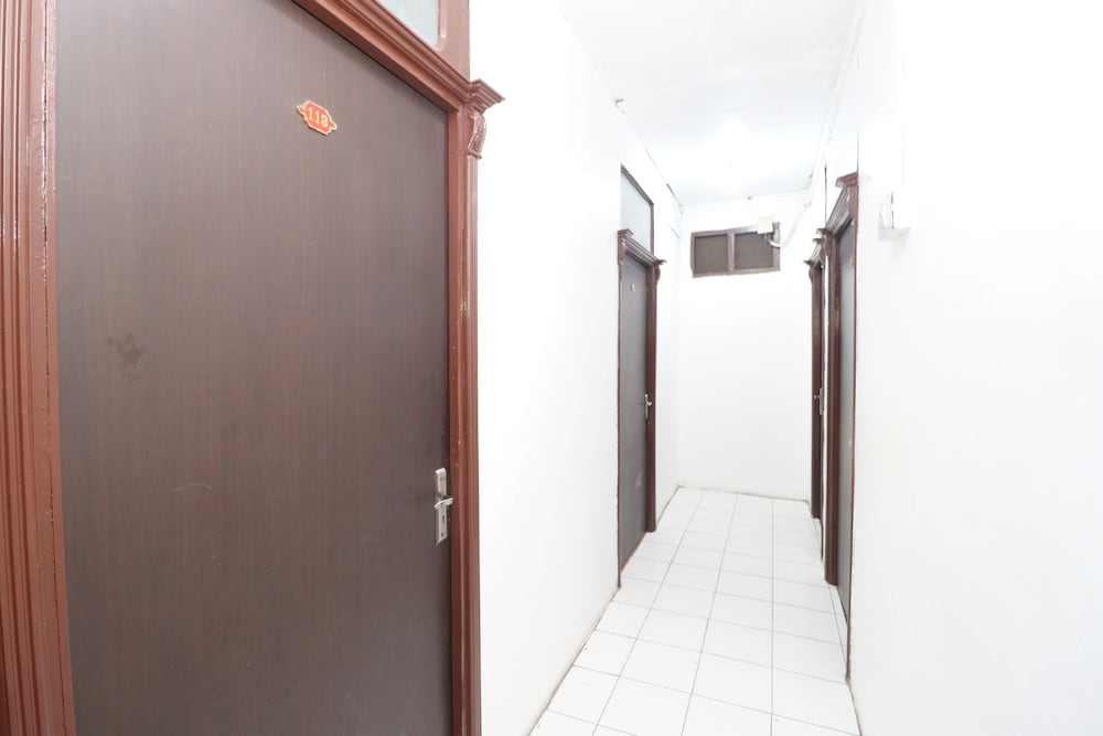 Фото Oyo 30274 Temple City Guest House