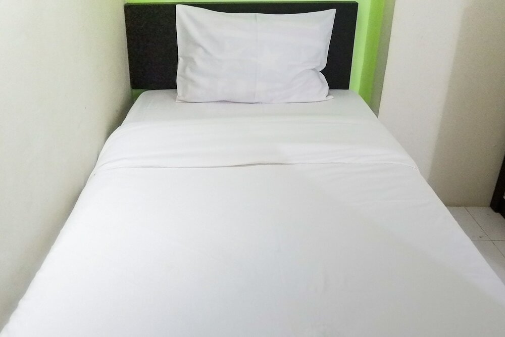 Фото Minimalist 2br at Dian Regency by Travelio