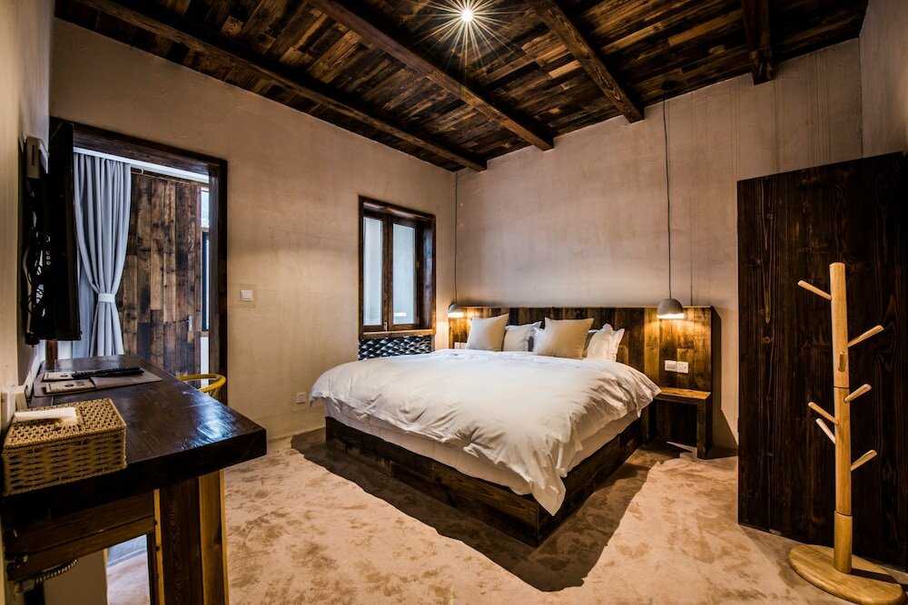 Фото Go Native Downtown House Ningbo