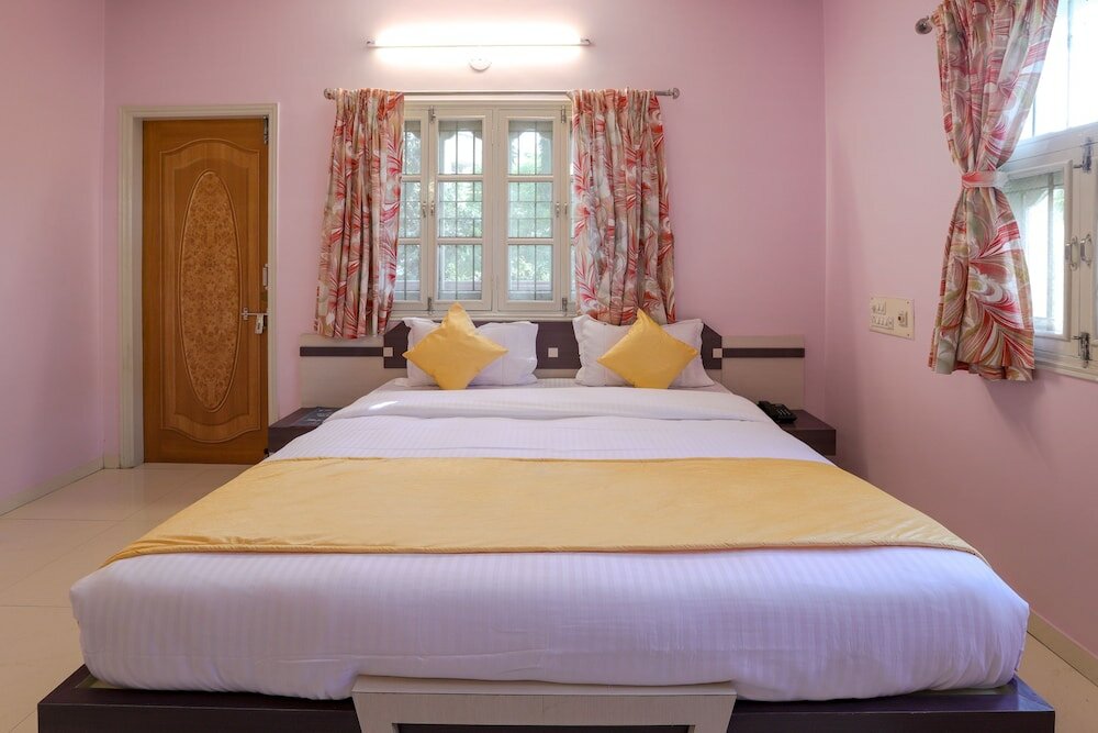 Фото Oyo 10031 Wind Chimes Boutique Guest House