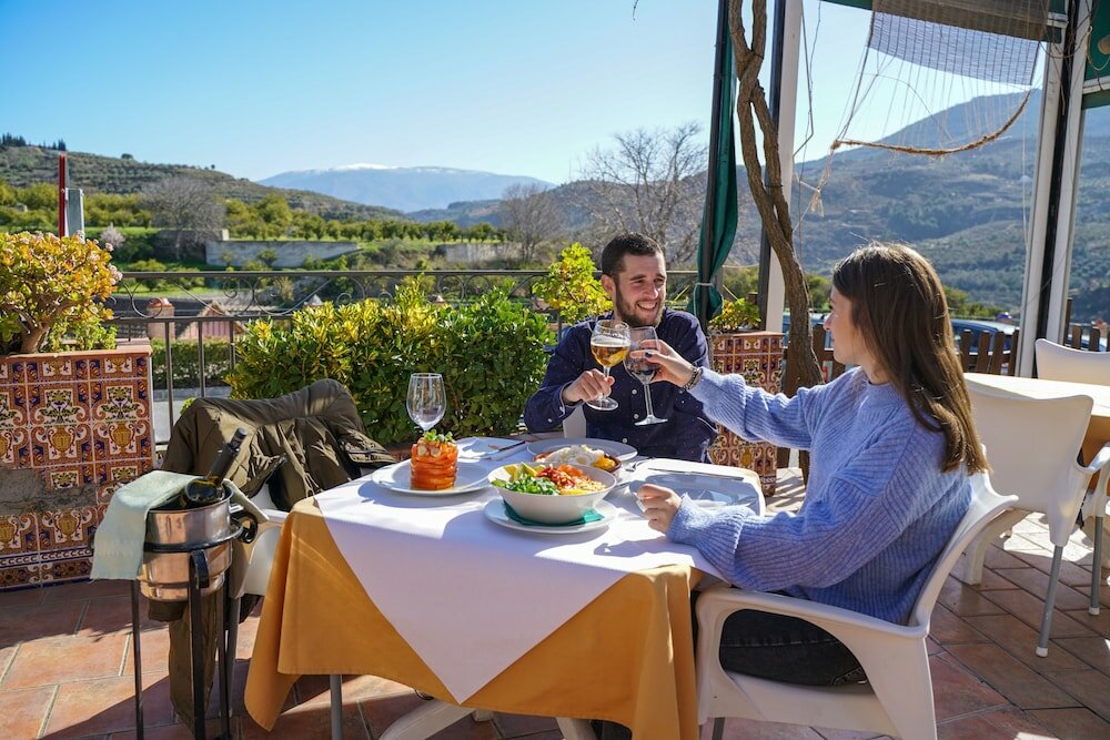 Фото Hostal y Apartamento Rural Los Naranjos