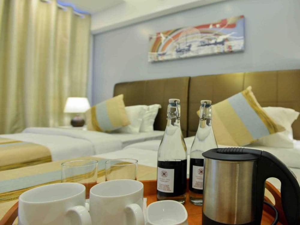 Фото Coconut Tree Hulhuvilla Beach