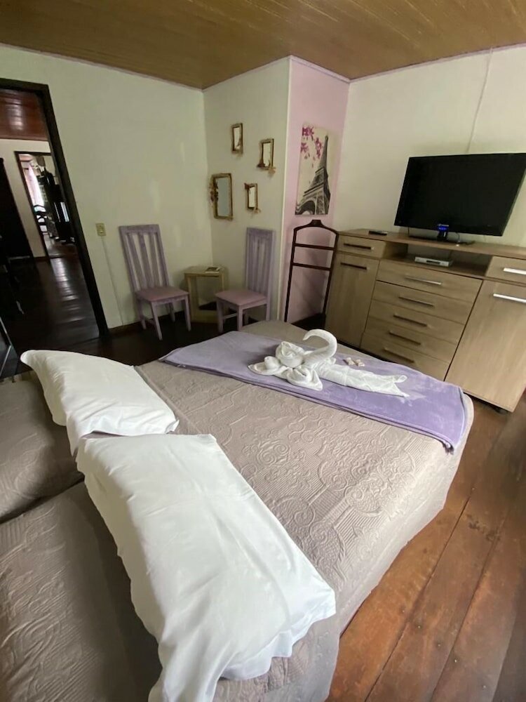 Фото Pousada Aconchegos Île de France