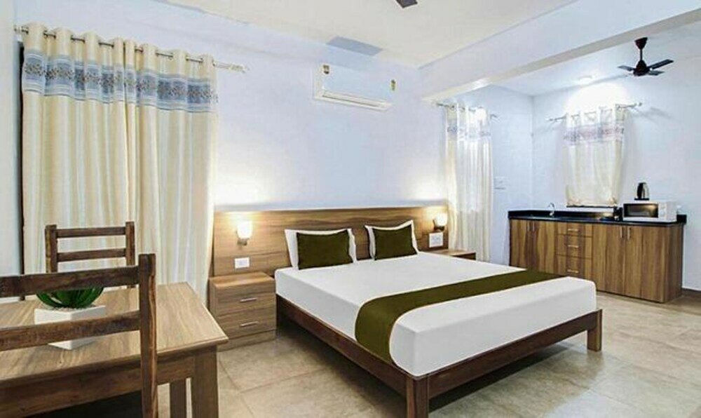 Фото Fabexpress Holiday Suites