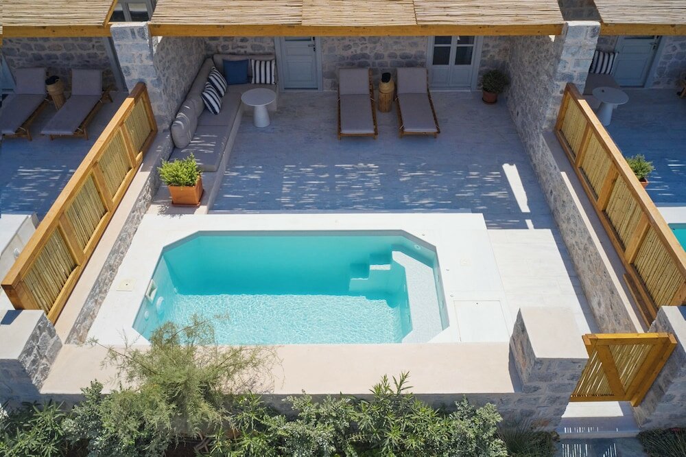 Фото Mandraki Beach Resort - Adults Only