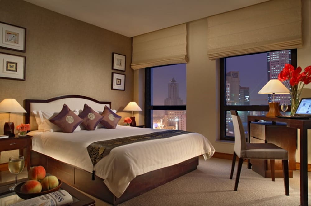 Фото Dalian Asia Pacific Service Apartment