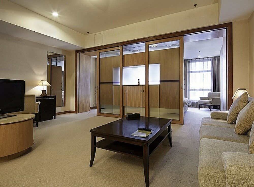 Фото Dalian Asia Pacific Service Apartment