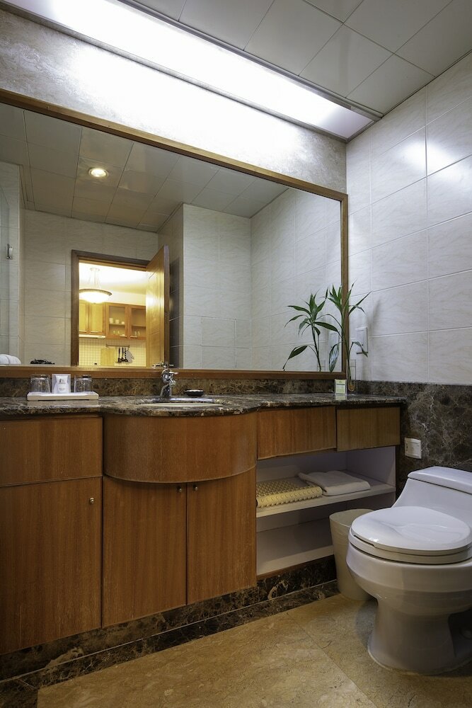 Фото Dalian Asia Pacific Service Apartment