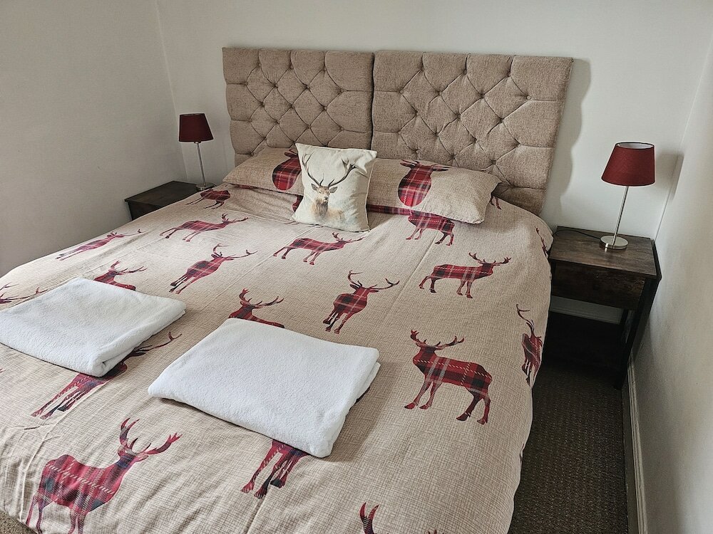 Фото Snug - Abhainn Apartment