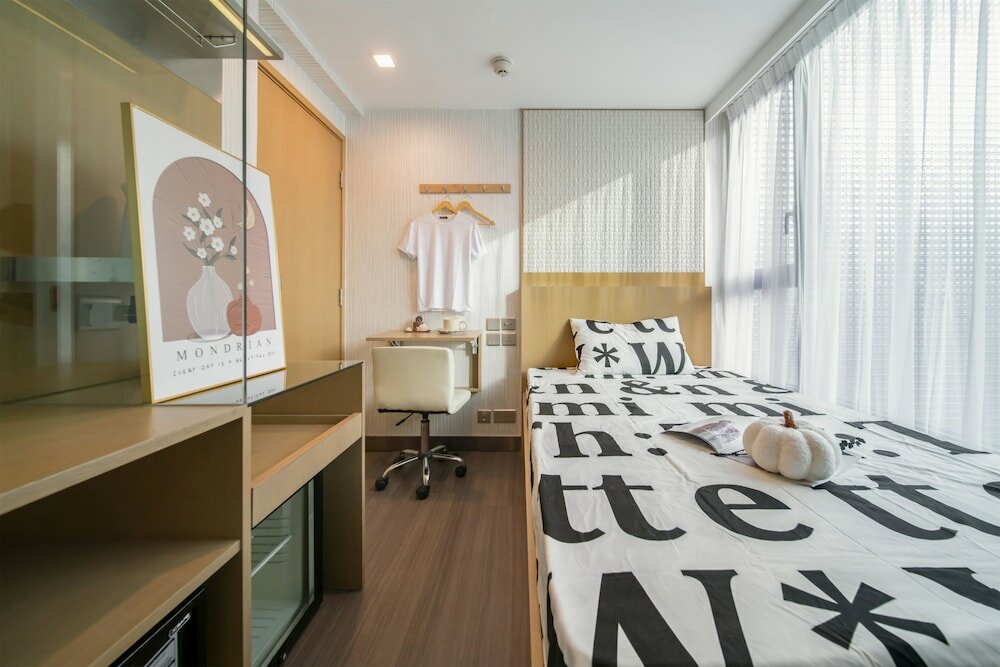 Фото Shingting Living Hotel Apartment