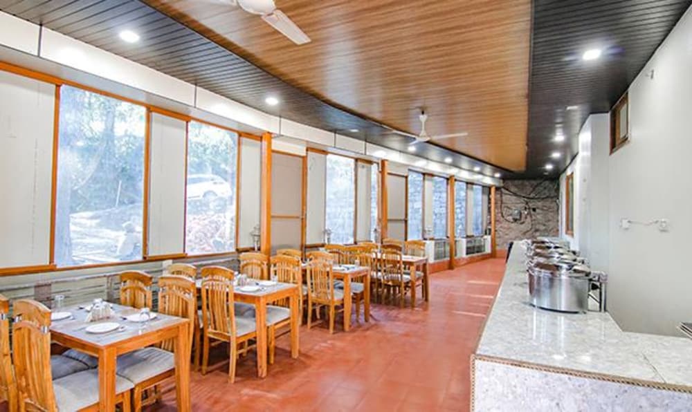 Фото Fabhotel Wildflower Inn