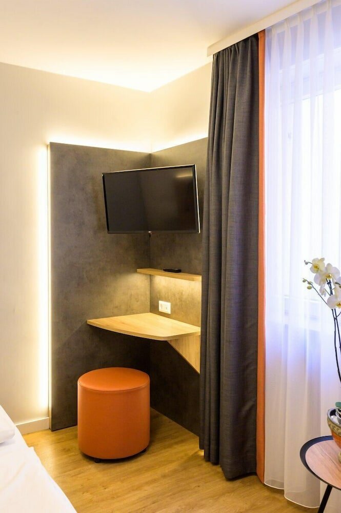 Фото Hotel Rieker Stuttgart Hauptbahnhof