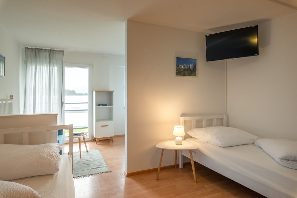 Фото Alpine Hostel Appartements