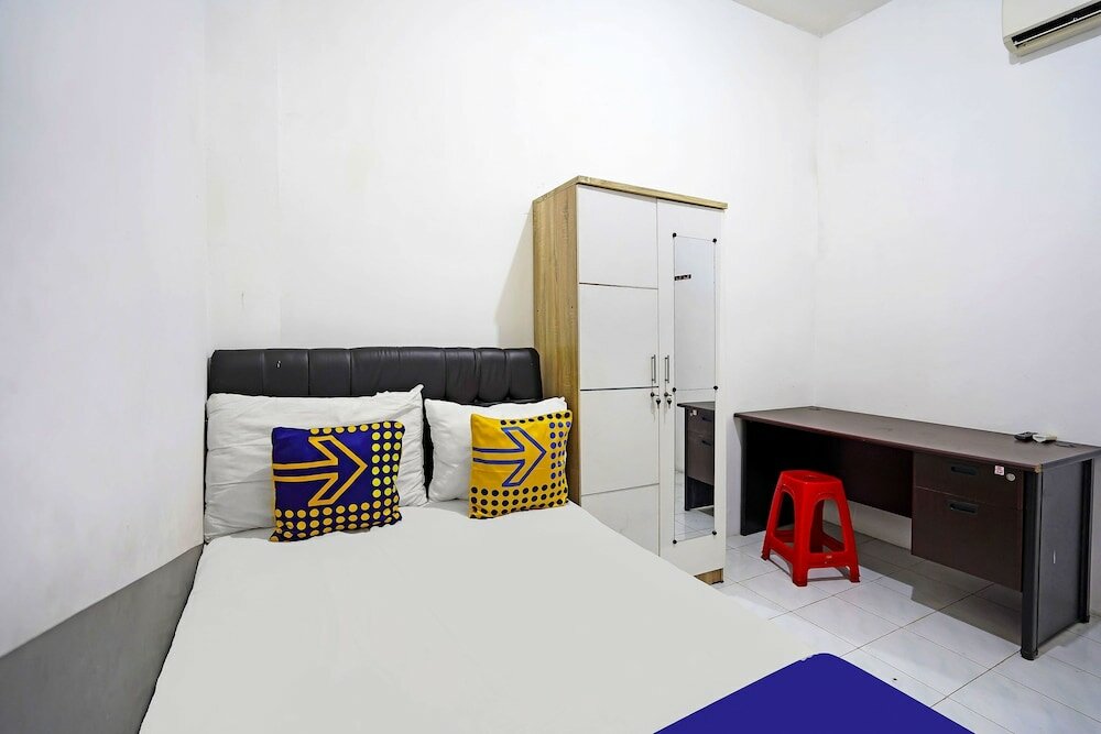 Фото Spot On 91360 Swk 68 Syariah