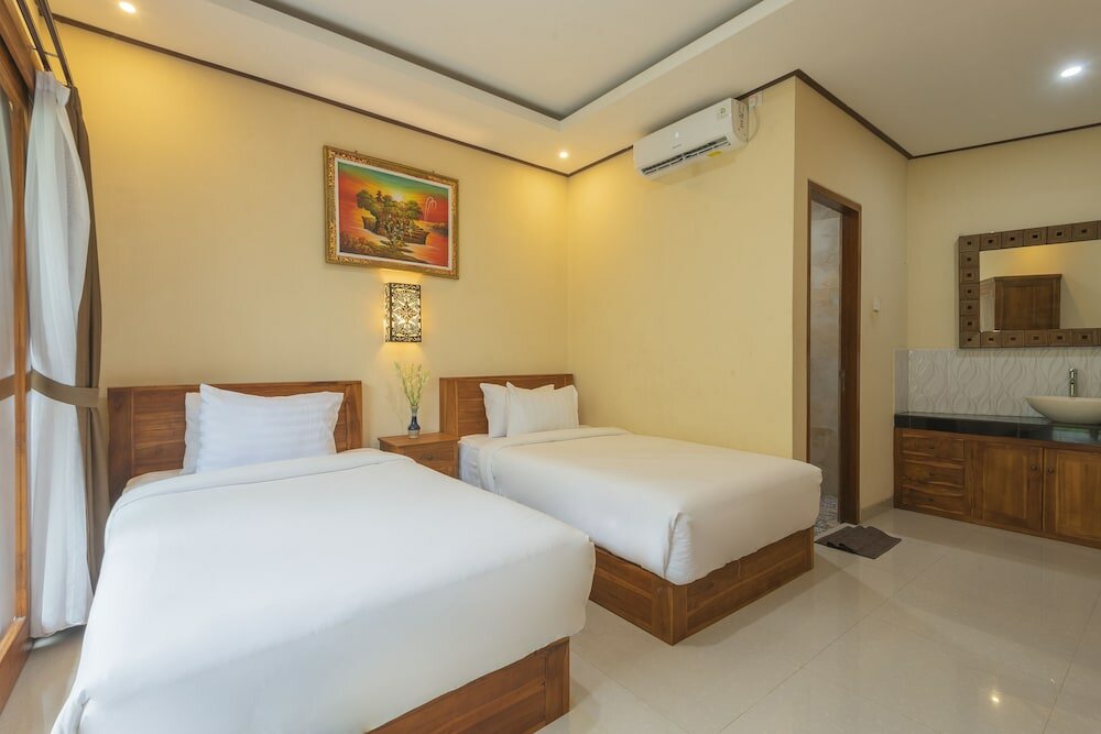 Фото Liliy Guest House Legian