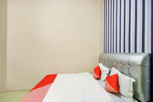 Гостиница Super Oyo 3389 Sonya Homestay Syariah в Тебингтинги