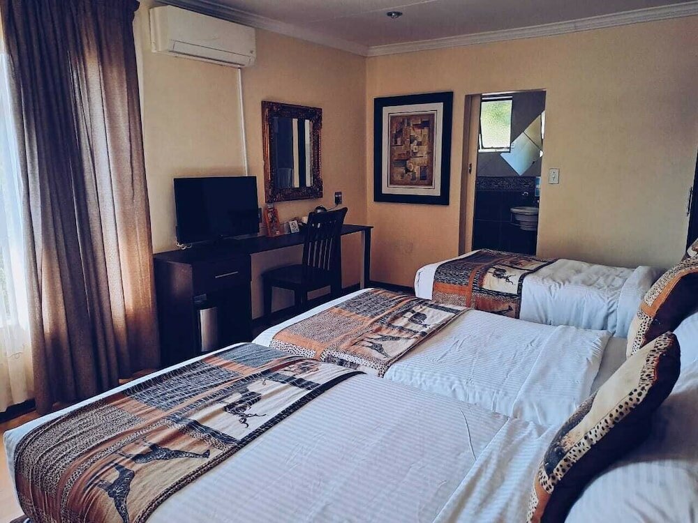 Фото Ecotel Premier Lodge & Conference Centre