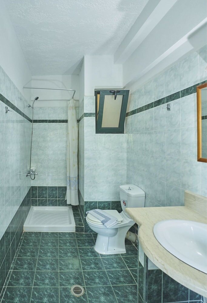 Фото Dionysos Apartments & Studios